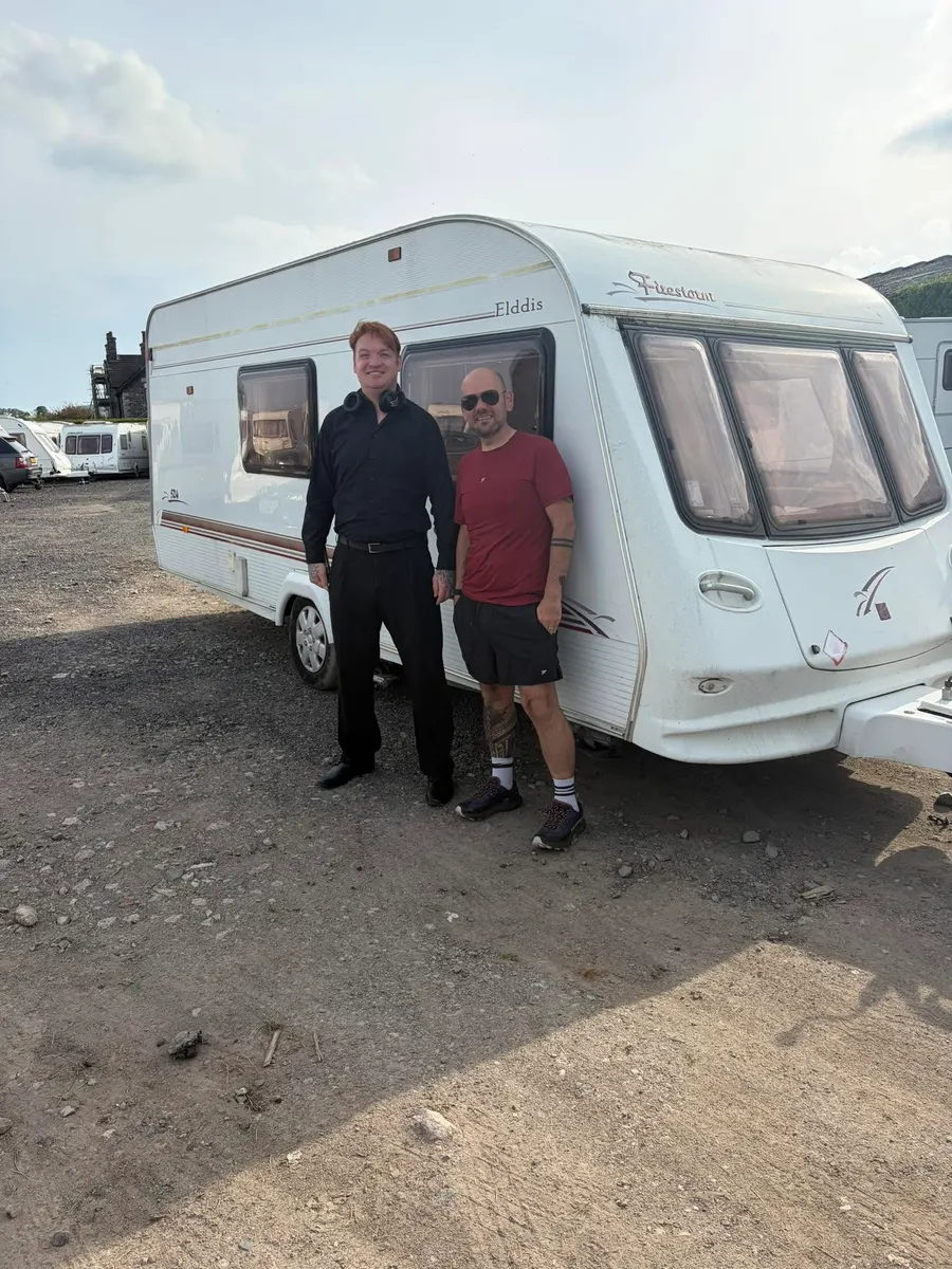 Happy North West Caravans customer with their touring caravan