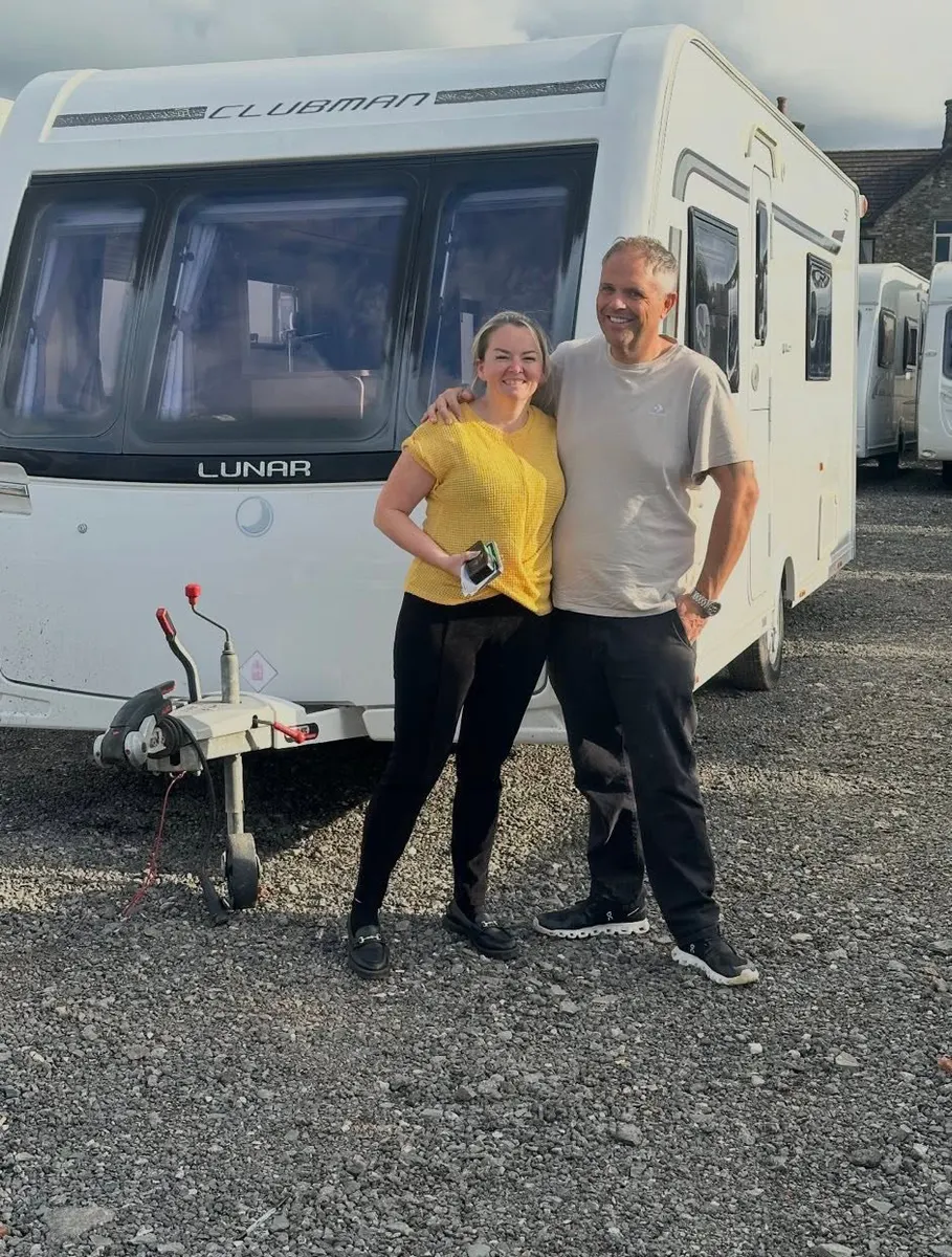 Happy North West Caravans customer with their touring caravan