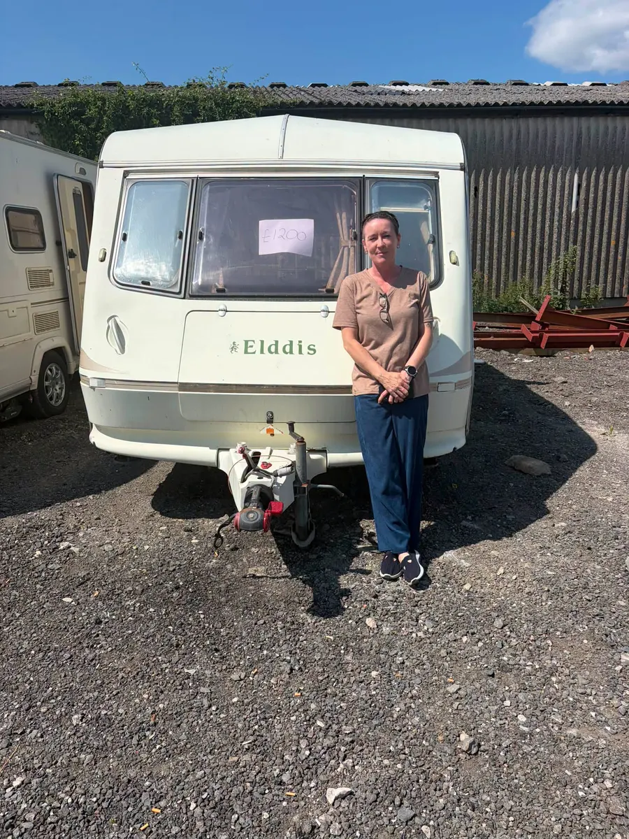 Happy North West Caravans customer with their touring caravan