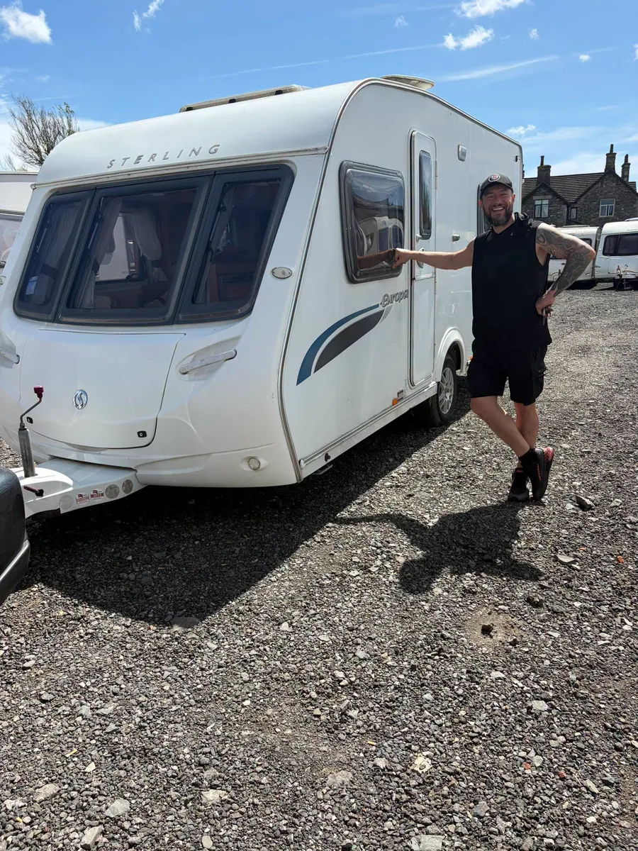 Happy North West Caravans customer with their touring caravan